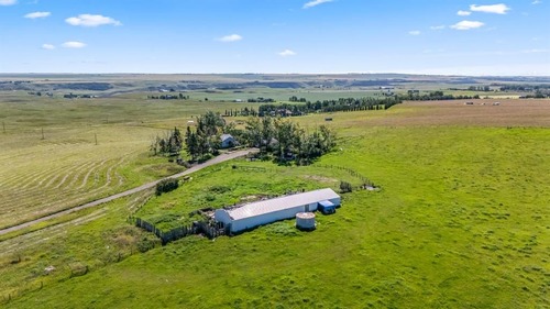 60-acre acreage in De Winton with mountain and city views